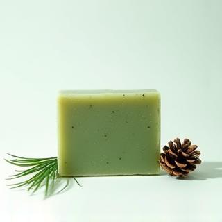 Handmade soap bar with pine needles